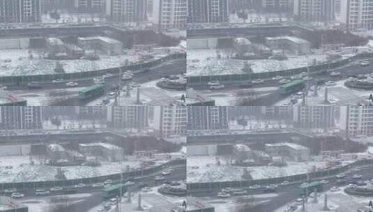 城市下雪天结冰路面车流雪花高清在线视频素材下载