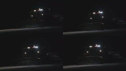 崇礼云顶滑雪场夜晚压雪车工作画面高清在线视频素材下载