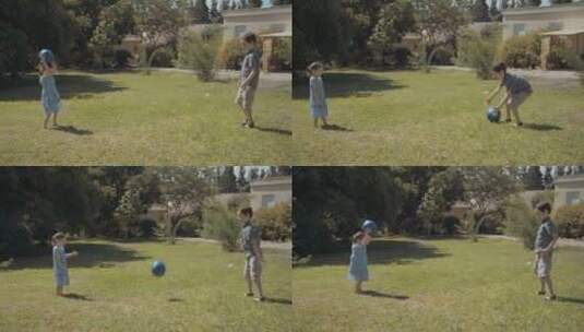 哥哥和妹妹在草地上开心的玩皮球高清在线视频素材下载