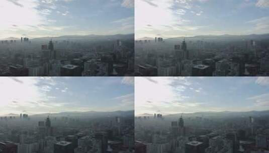 航拍薄雾笼罩下的城市景观高清在线视频素材下载
