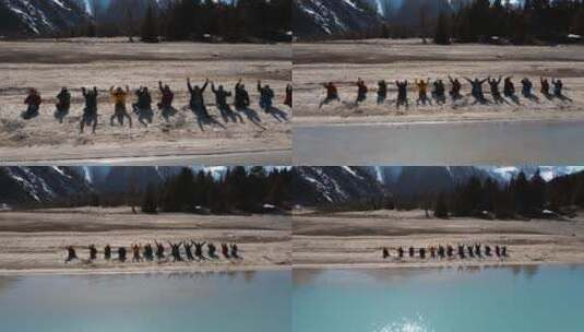 西藏风光视频高原湖泊一群摄影爱好者招手高清在线视频素材下载