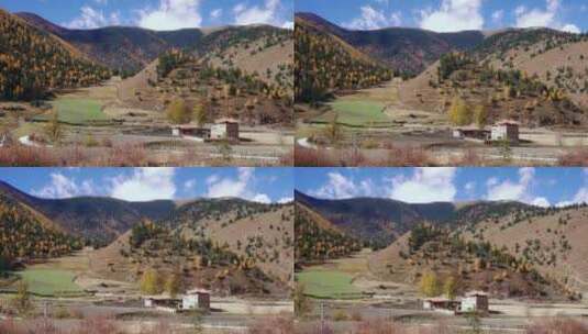 新都桥周边秋日风景大山蓝天和藏民房屋高清在线视频素材下载