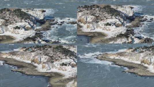 长焦航拍冬季雪后的威海小石岛高清在线视频素材下载