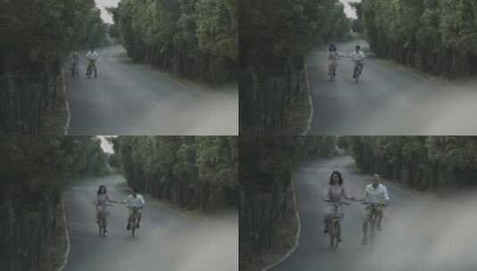情侣浪漫骑单车度假在路上高清在线视频素材下载