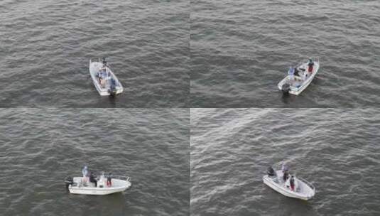 穿着蓝色救生衣的男子站在船上高清在线视频素材下载
