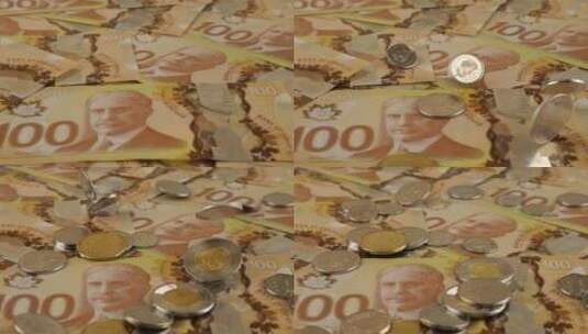 硬币落在纸币上高清在线视频素材下载