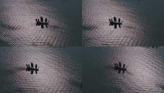 俯拍夕阳下湖州太湖上一只渔船 渔舟唱晚高清在线视频素材下载