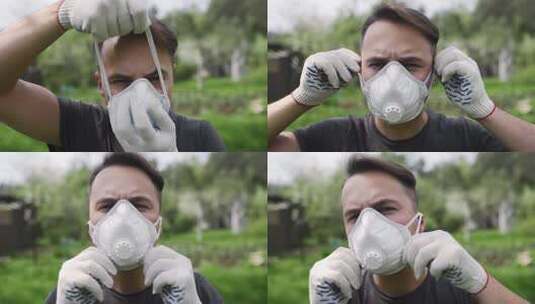 戴工作手套的人在户外戴上呼吸器，对人体的高清在线视频素材下载