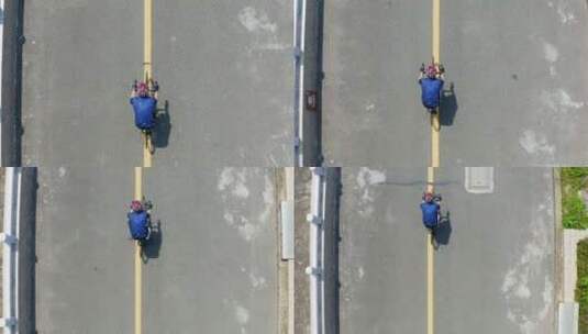 俯拍升空自行车公路车航拍高清在线视频素材下载