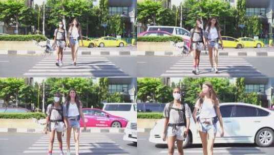 两个过马路的女人高清在线视频素材下载