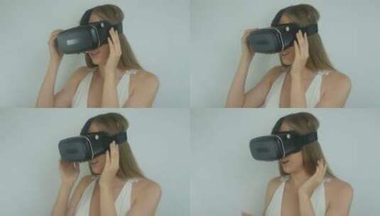 戴着虚拟现实头盔的美丽女人高清在线视频素材下载