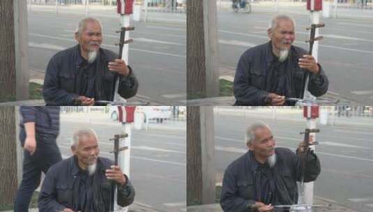 老人  乞丐 街头艺人高清在线视频素材下载