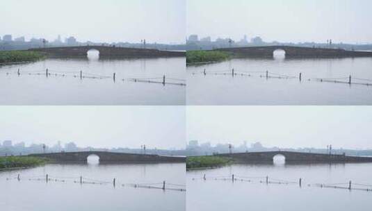 杭州西湖白堤著名景点断桥残雪忙碌的游客高清在线视频素材下载