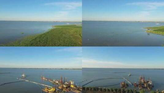 航拍湿地湖泊船只实拍4K高清在线视频素材下载