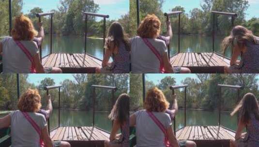 人们在河边的河里划船高清在线视频素材下载