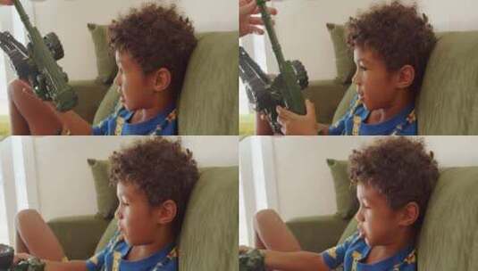 孩子从小就被要求玩玩具枪一种武器一种不良的教养传统高清在线视频素材下载