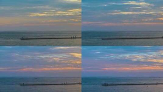 海南海边沙滩码头椰树度假游人夕阳日落延时高清在线视频素材下载