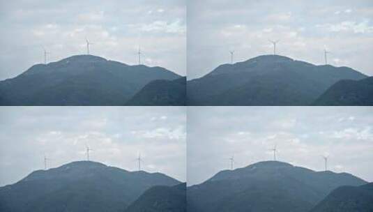风车风力发电机高山大山天空白云高清在线视频素材下载