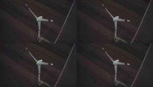 风力涡轮机在野外空中旋转高清在线视频素材下载