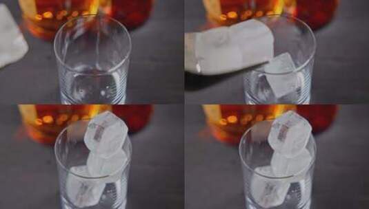 酒保将用于冷却的冷冰块放入瓶子背景上的玻高清在线视频素材下载