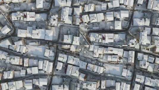 白雪覆盖的屋顶航拍高清在线视频素材下载