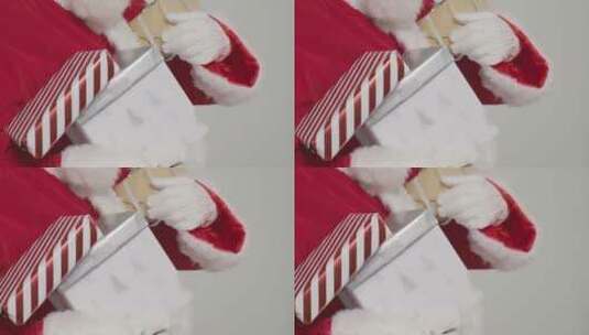 圣诞老人拿着许多礼物的特写镜头高清在线视频素材下载