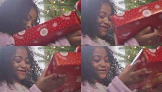 女孩在阅读礼物盒上的标签高清在线视频素材下载