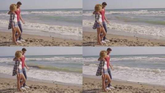 沙滩上的年轻情侣高清在线视频素材下载