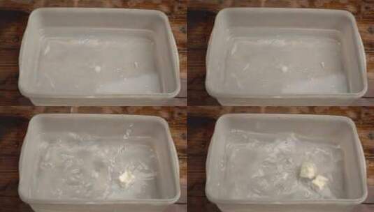 传统食品豆腐块入水4k视频高清在线视频素材下载