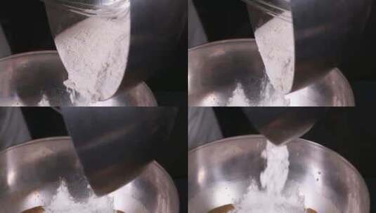 不锈钢盆倒面粉和面高清在线视频素材下载