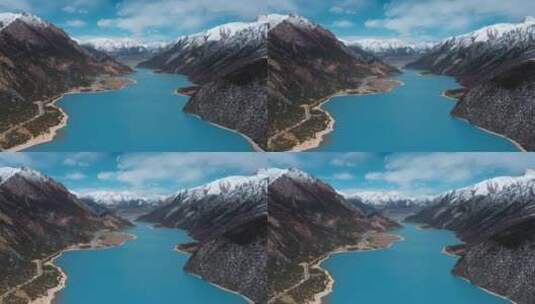雪山湖泊视频青藏高原湖泊蓝色湖水周围雪山高清在线视频素材下载