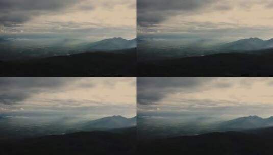 从高山上俯瞰云雾缭绕的全景高清在线视频素材下载