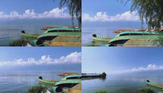 合集洱海边停泊的渔船蓝天白云海天一色高清在线视频素材下载