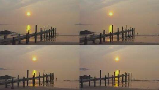日出日落，阳光照在海面，独木桥太美了高清在线视频素材下载