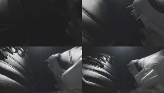 黑色足球靴的极端特写镜头高清在线视频素材下载