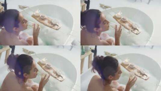 女人坐在浴缸里喝香槟 高清在线视频素材下载
