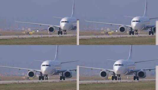 东方航空客机飞机进港跑道滑行特写波音737高清在线视频素材下载