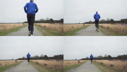 男人奔跑的背影男人跑步运动服高清在线视频素材下载