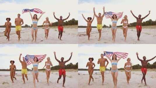 朋友与美国国旗运行在夏季海滩34高清在线视频素材下载