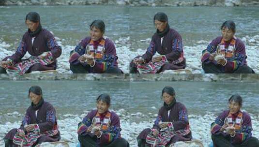 藏族妇女河边纺线劳作生活高清在线视频素材下载