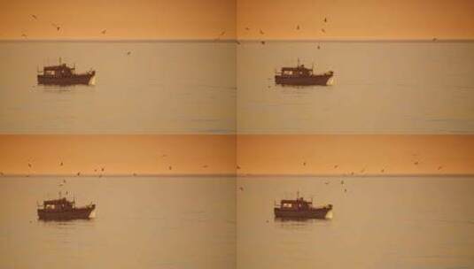日落时海上的渔船高清在线视频素材下载