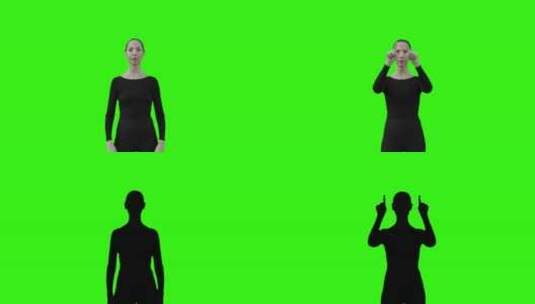 用手指画多个绿色屏幕虚拟方块的女人。高清在线视频素材下载
