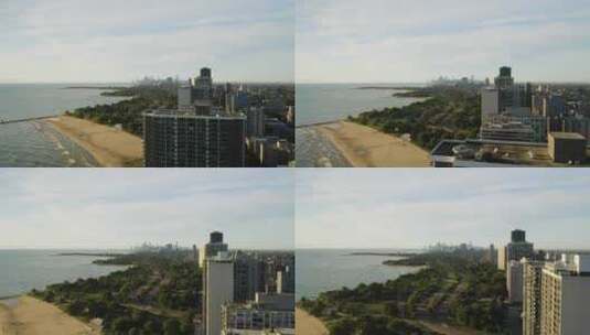 无人机飞过高层公寓，露出湖岸大道，背景是芝加哥天际线高清在线视频素材下载