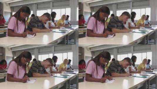 多种族大学生在课堂上考试高清在线视频素材下载