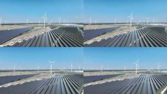 光伏太阳能发电站和风力发电风车航拍高清在线视频素材下载