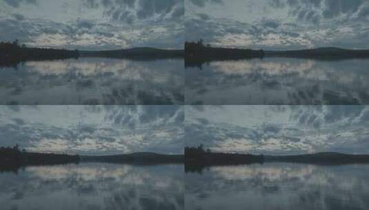 低角度航拍湖面和天空对称高清在线视频素材下载