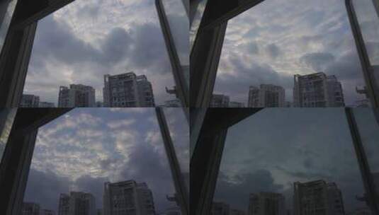 城市楼宇窗外天空云变化高清在线视频素材下载