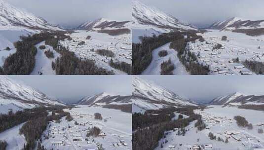 航拍新疆禾木雪景森林雪地小木屋禾木桥雪山高清在线视频素材下载