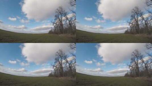 草地上移动的云朵高清在线视频素材下载