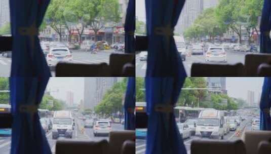 大巴车行驶窗外城市街景高清在线视频素材下载